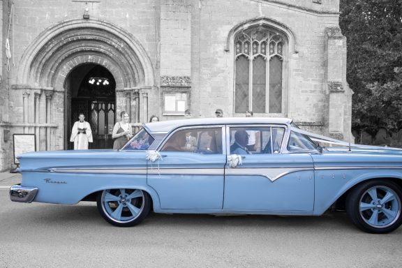 Vintage wedding car arrival photography
