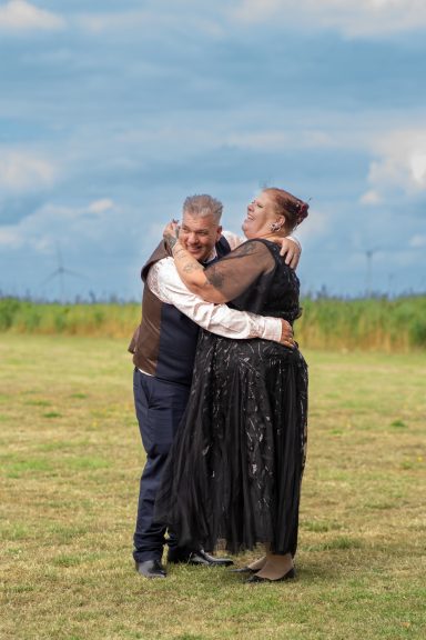Candid wedding couple portrait outdoors